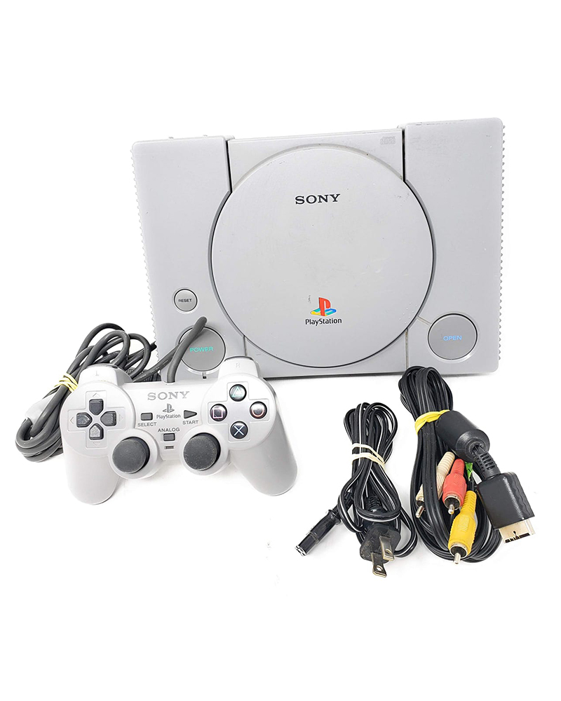 PlayStation 1 with cables and joystick